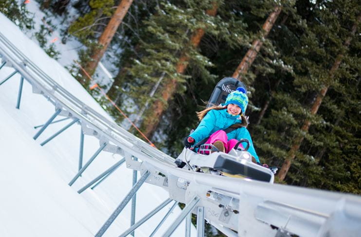 A child enjoys the Breathtaker Alpine Coaster