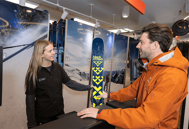 Guest checks out at the Snowmass Ski Resort ski rental booth