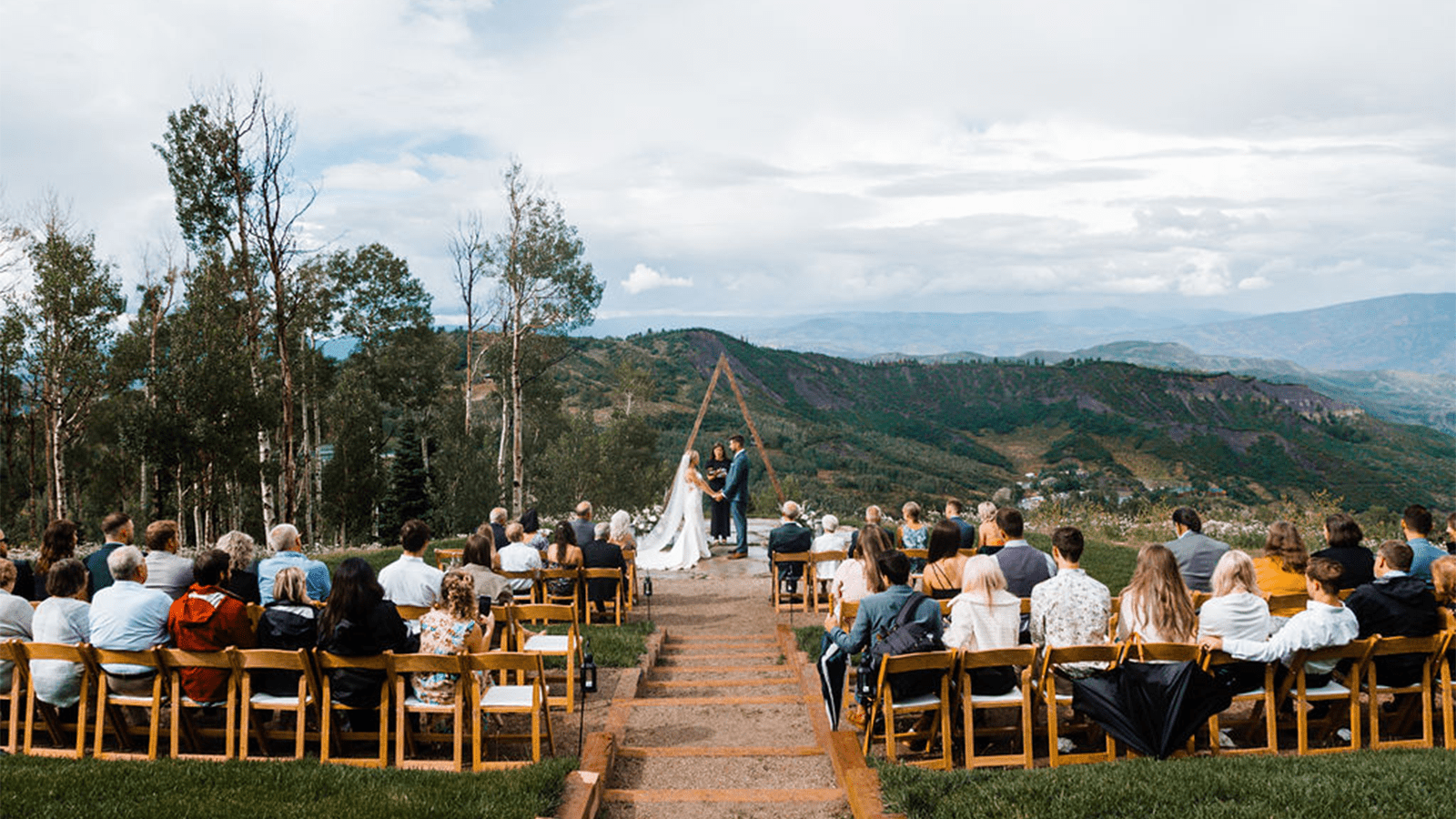 guests gather at a wedding at the Snowmass terrace, on a fall day