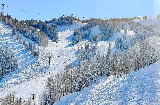 Snowmaking starts at Aspen Snowmass and natural snow accumulates at  mountaintops