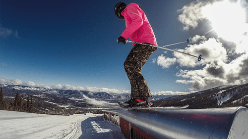 Aspen Skier Riding a Rail